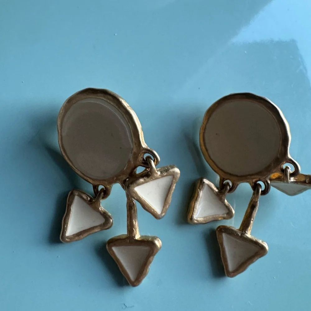 Vintage cream enamel and gold tone clip on dangle earrings